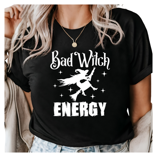 a woman wearing a bad witch energy t - shirt