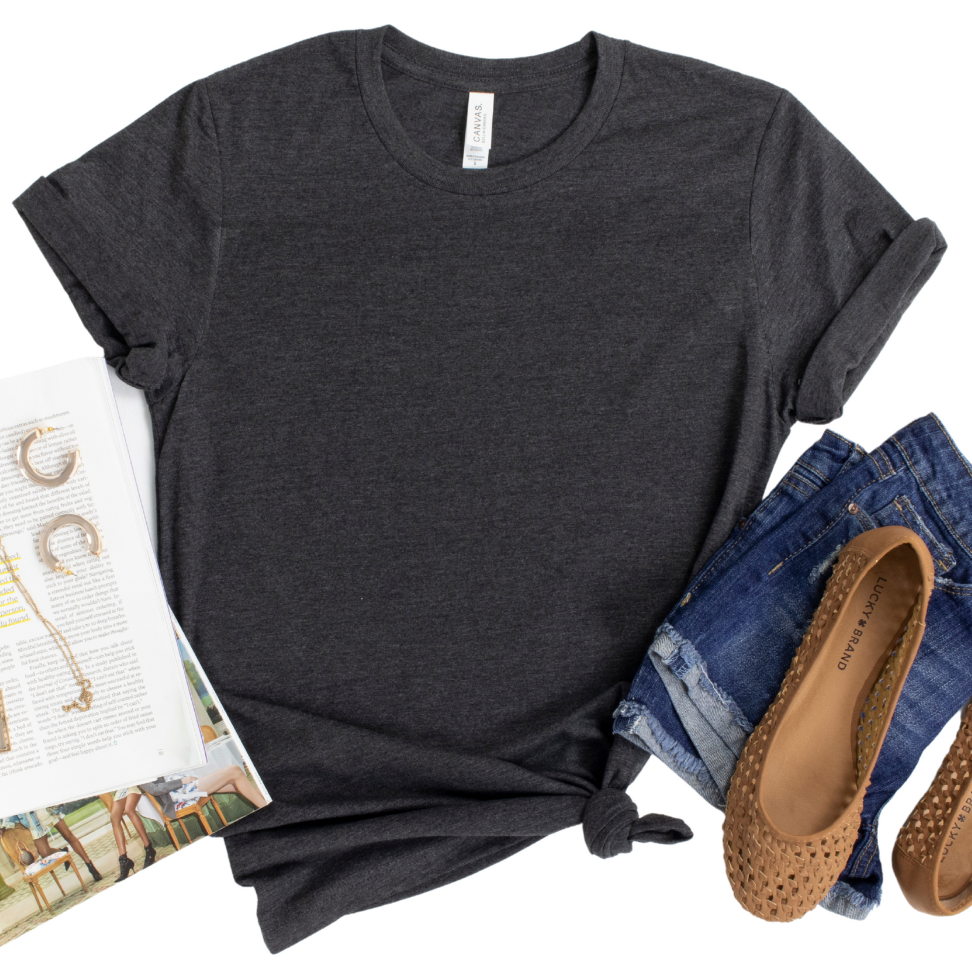 a t - shirt, pair of jeans and a pair of shoes