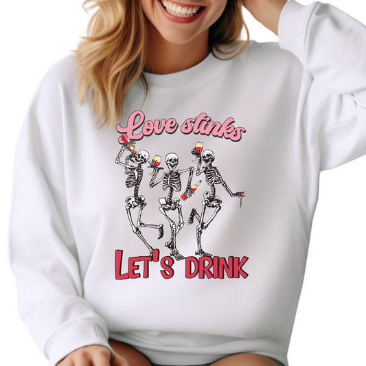 Love Stinks Let’s Drink T-Shirt - Funny Skeleton Valentine’s Day Graphic Tee - Anti-Love Humor Shirt - Trendy Party Outfit for Women