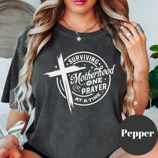 Surviving Motherhood One Prayer At A Time Shirt, Comfort Colors® Faith Based Mom Tee, Christian Mom Gift, Motherhood Shirt, Tired Mama Tee