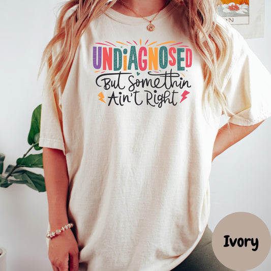 Undiagnosed But Somethin Ain’t Right Shirt, Comfort Colors® Funny Mental Health Tee, Rainbow Graphic T-Shirt, Sassy Unfiltered Shirt