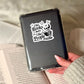 I Like Books More than People Funny Skeleton – 3" Waterproof Bookish Sticker with Holo Overlay – Reading, Books, Reader Gift, Book Lover