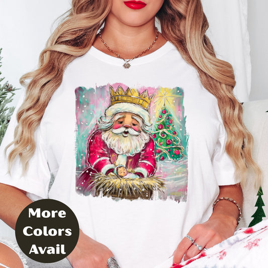 Santa Kneeling at Manger Shirt or Sweatshirt – Colorful Christmas Top S-4XL Plus Size – Santa & Nativity Tee – Holiday Christian Gift