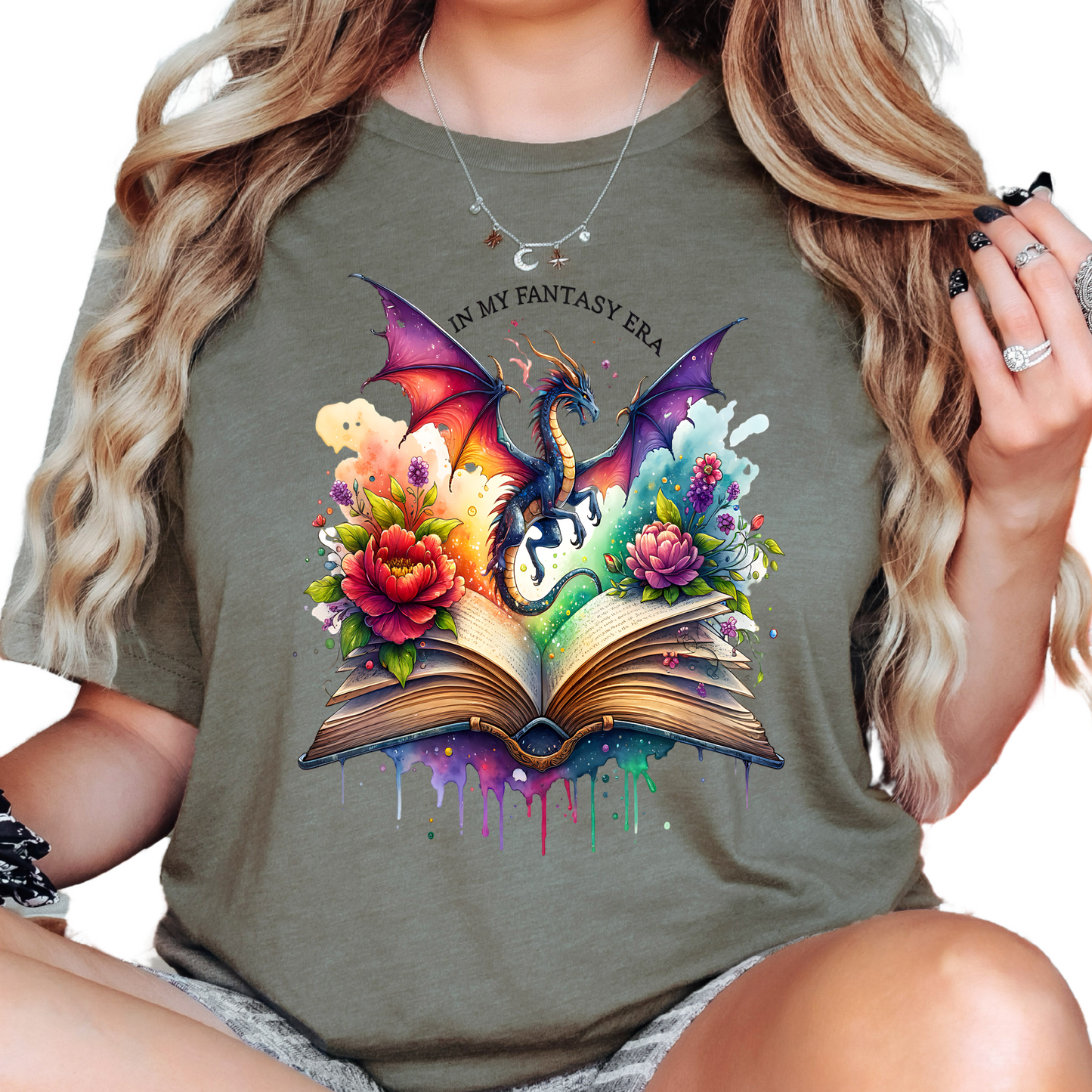 a woman wearing a t - shirt with a dragon and flowers on it