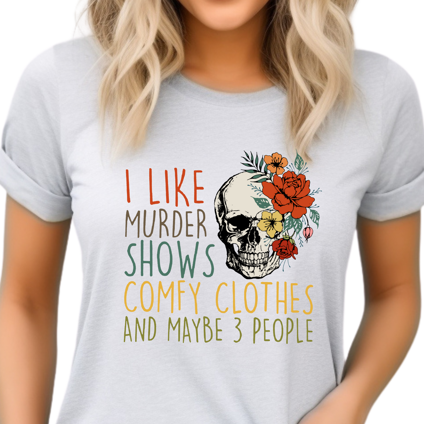 a woman wearing a t - shirt that says i like murder shows comfy clothes