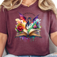 a woman wearing a t - shirt with a dragon and flowers on it